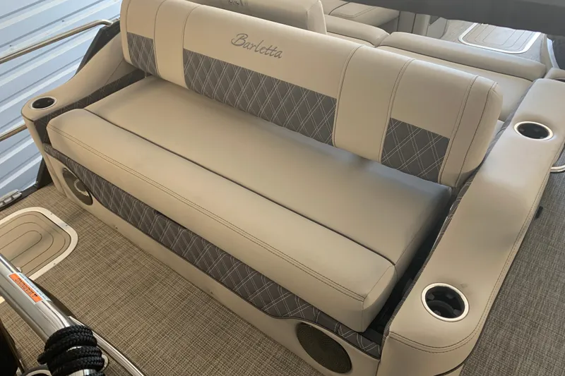 Slide: The Image of Luxurious seating on 2022 Barletta LUSSO 25U pontoon boat with cup holders. - 6