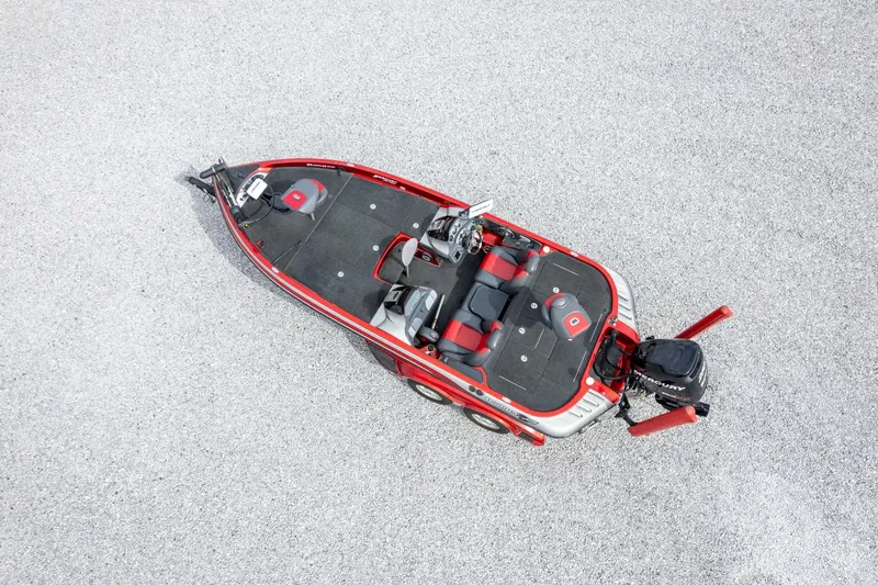 Slide: The Image of 2009 Ranger Z520 Comanche boat, aerial view, red and black design on gravel surface. - 50