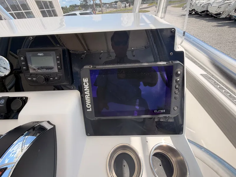 Slide: The Image of The image shows the dashboard of a Savannah 190 IS boat with a Lowrance Elite screen. - 9
