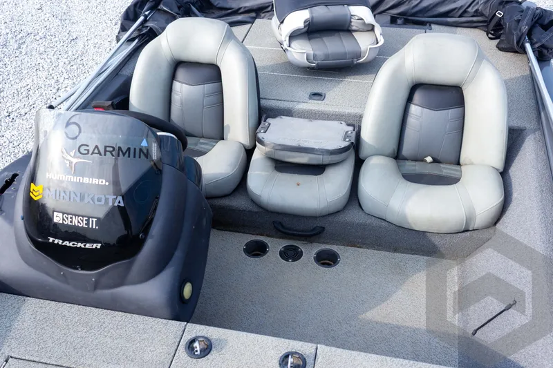 Slide: The Image of 2019 Tracker Pro Team 190 TX boat interior with Garmin, Humminbird, and Minn Kota equipment. - 21