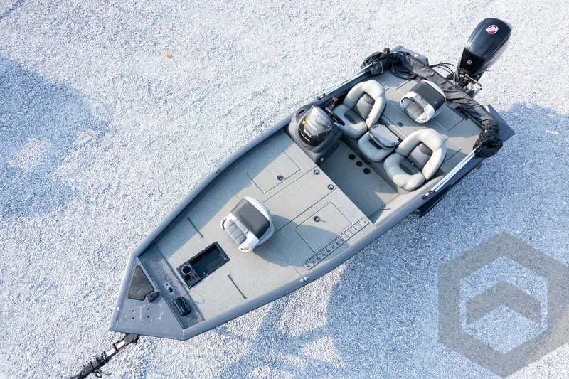 Slide: The Image of 2019 Tracker Pro Team 190 TX fishing boat on gravel surface, aerial view. - 28
