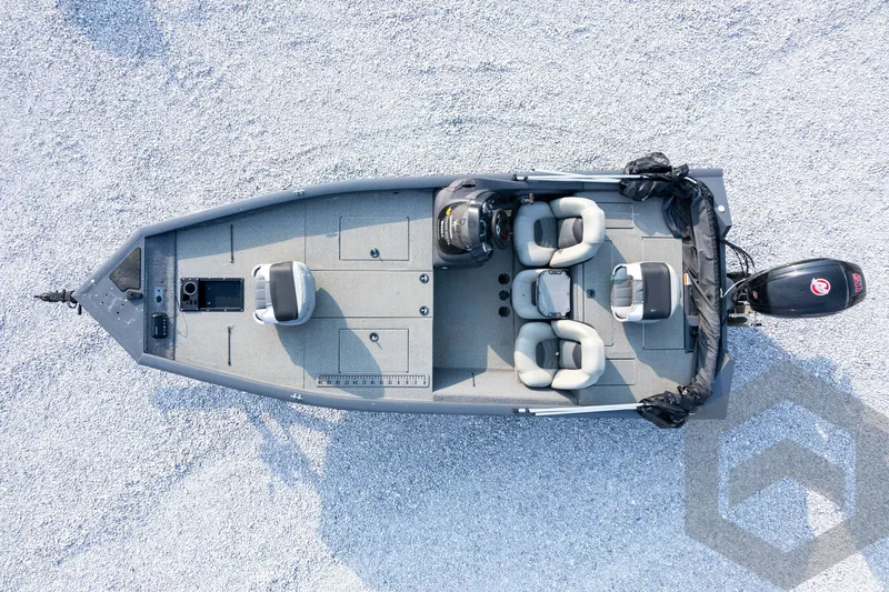 Slide: The Image of 2019 Tracker Pro Team 190 TX fishing boat, aerial view on gravel surface. - 25