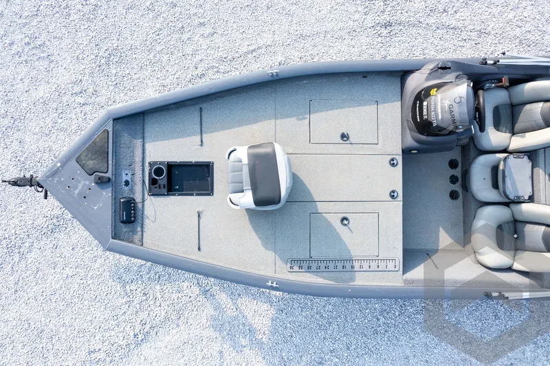 Slide: The Image of 2019 Tracker Pro Team 190 TX fishing boat, aerial view, spacious deck, seating, and motor. - 26