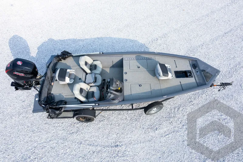 Slide: The Image of 2019 Tracker Pro Team 190 TX fishing boat on gravel, aerial view. - 33