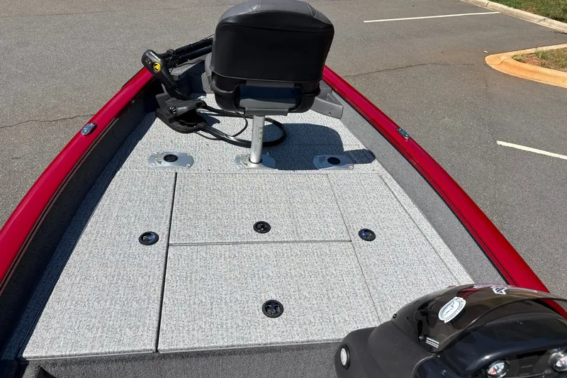 Slide: The Image of 2024 Tracker Pro Team 175 TF boat deck with seating and storage compartments. - 19