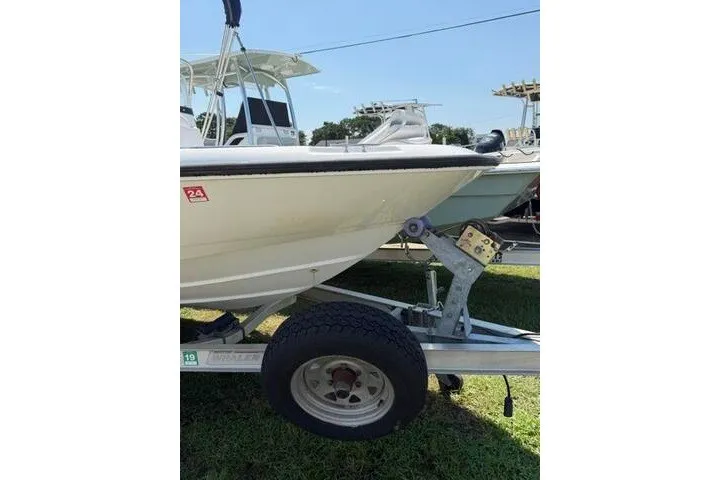Slide: The Image of 2008 Boston Whaler 180 Dauntless boat on trailer, side view. - 4