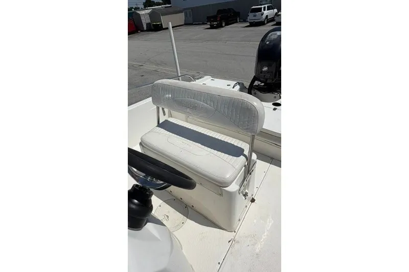 Slide: The Image of 2008 Boston Whaler 180 Dauntless boat interior with seating and steering wheel. - 22