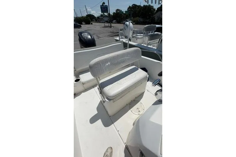 Slide: The Image of 2008 Boston Whaler 180 Dauntless boat interior with seating and console view. - 14
