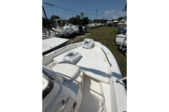 Slide: The Image of 2008 Boston Whaler 180 Dauntless boat deck, white seating, outdoor display. - 11