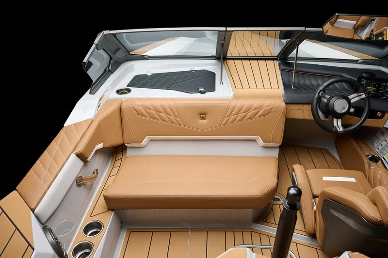 Slide: The Image of Manufacturer Provided Image: 2026 Nautique Ski Nautique interior with tan leather seats and modern dashboard design. - 14