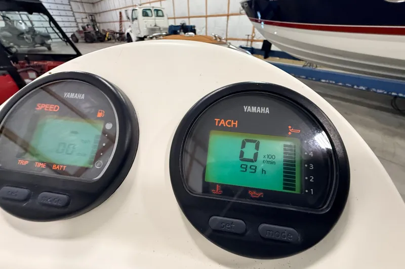 Slide: The Image of Yamaha speed and tachometer gauges on a 2013 Zodiac Yachtline 2 Deluxe 340. - 11