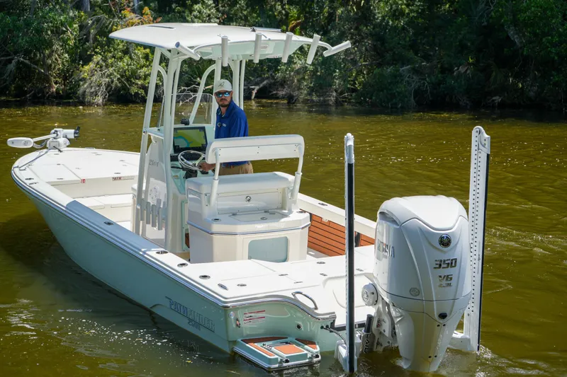 Slide: The Image of 2026 Pathfinder 2500 Tournament boat with Yamaha 350 V6 engine on a calm river. - 19