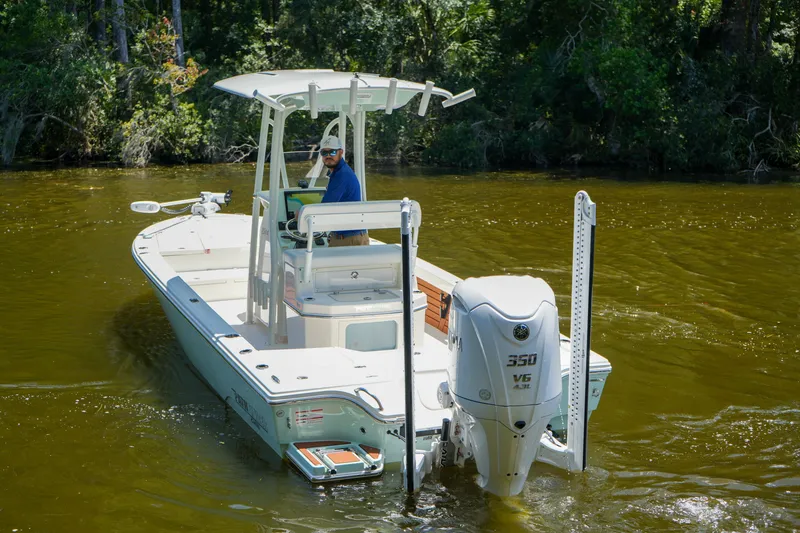 Slide: The Image of 2026 Pathfinder 2500 Tournament boat navigating a river, featuring a powerful 350 V6 engine. - 17