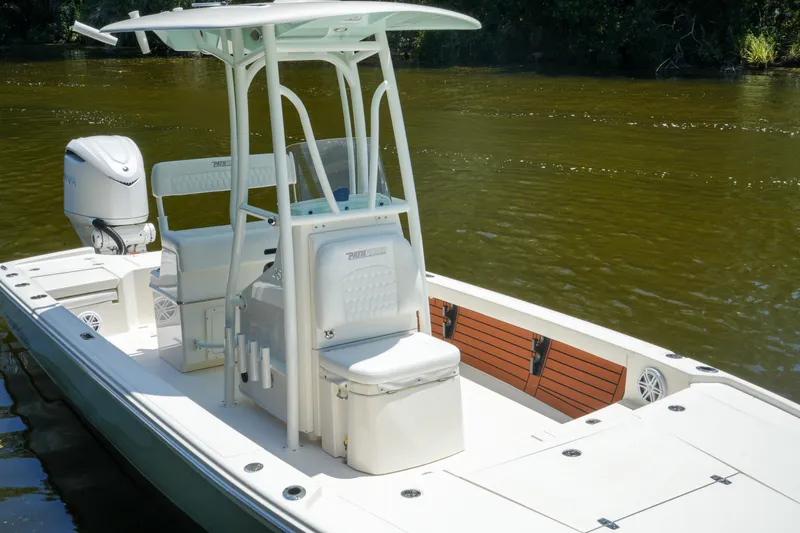 Slide: The Image of 2026 Pathfinder 2500 Tournament boat on calm water, featuring sleek design and modern amenities. - 5