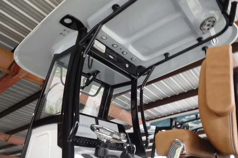 The Image of 2027 Sea Hunt Gamefish 25 boat interior with modern helm and seating. - 1