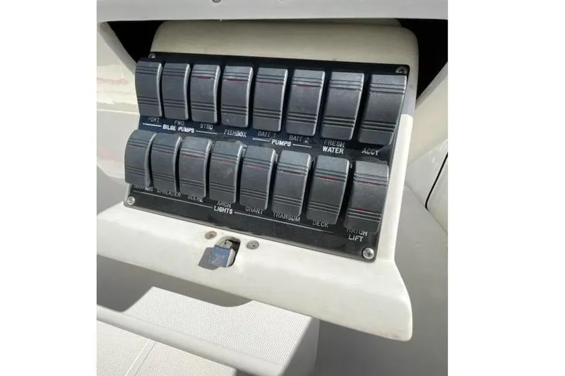 Slide: The Image of Switch panel of a 2009 Midnight Express 34 Open boat. - 16