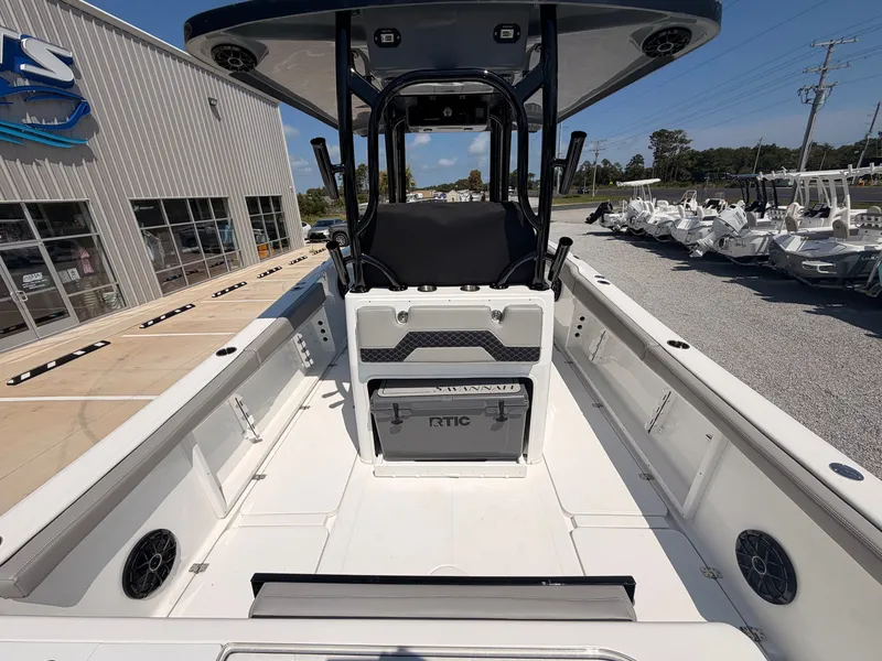 Slide: The Image of The image shows the cockpit of a 2027 Savannah 2900 Offshore boat with modern seating. - 20