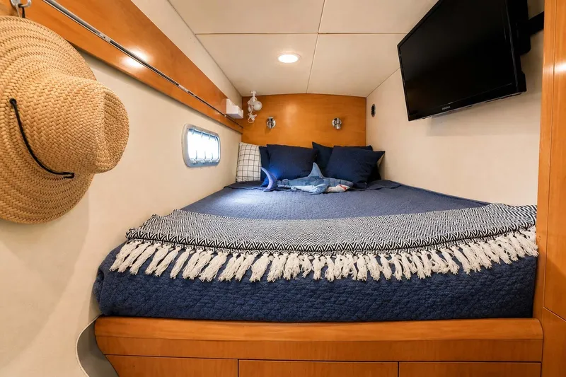 Slide: The Image of Cozy cabin interior of 2006 Fountaine Pajot Highland 35 Pilot with bed and TV. - 26