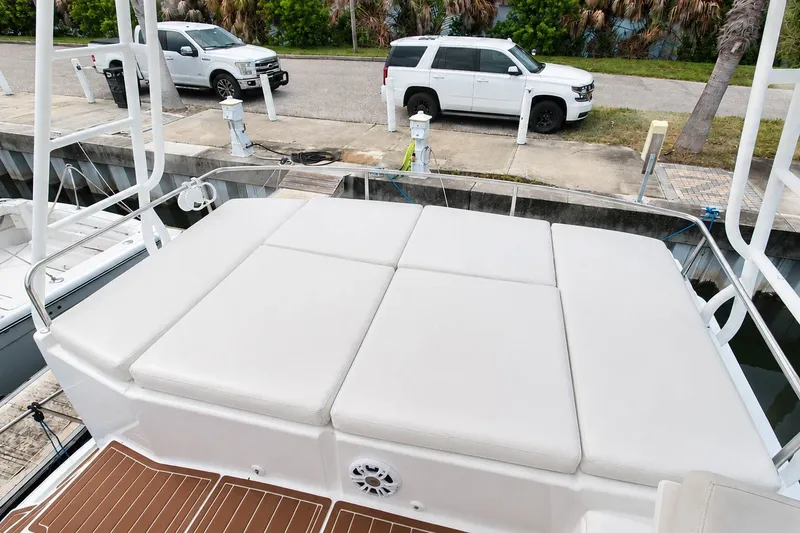 Slide: The Image of 2006 Fountaine Pajot Highland 35 Pilot boat with spacious deck seating at dockside. - 16