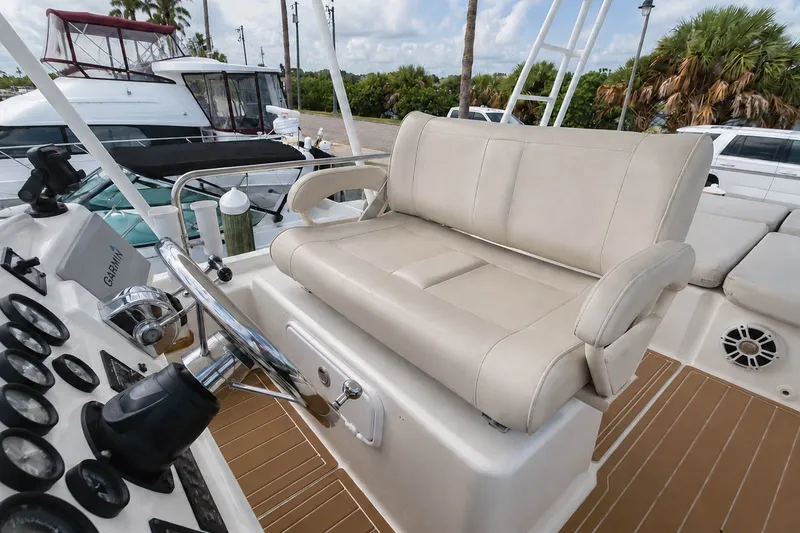 Slide: The Image of Helm seating area of 2006 Fountaine Pajot Highland 35 Pilot with steering wheel and controls. - 15