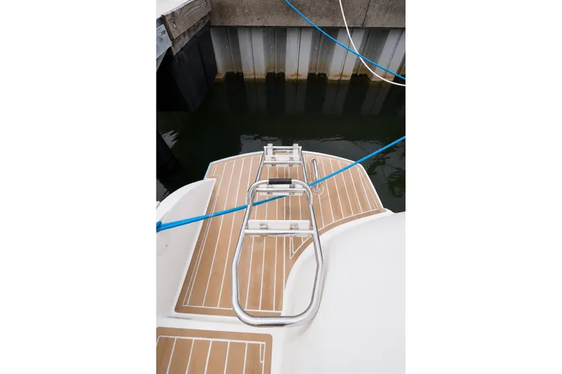 Slide: The Image of Rear deck of 2006 Fountaine Pajot Highland 35 Pilot with ladder and dock ropes. - 13