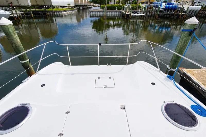 Slide: The Image of 2006 Fountaine Pajot Highland 35 Pilot yacht docked at a marina. - 8