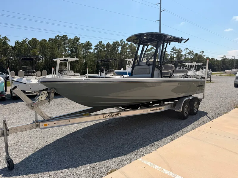Slide: The Image of The image shows a gray Savannah 220 IS boat from 2027 on a trailer. - 5