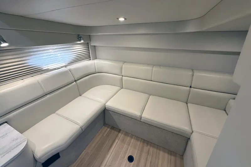 Slide: The Image of Interior of 2016 Formula 40 Performance Cruiser with plush white seating and modern design. - 27