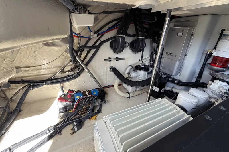 Slide: The Image of Engine room of a 2016 Formula 40 Performance Cruiser with wiring and mechanical components. - 37