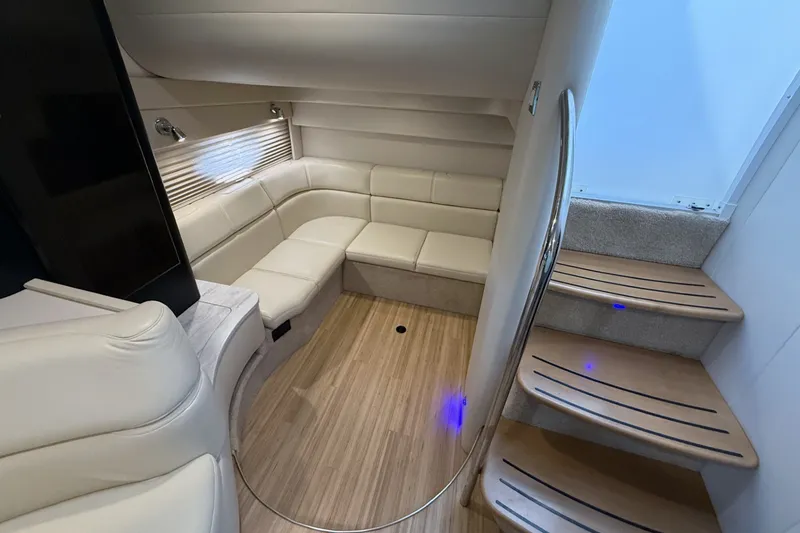 Slide: The Image of Interior of 2016 Formula 40 Performance Cruiser with beige seating and wooden steps. - 26