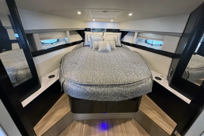 Slide: The Image of Luxurious interior of a 2016 Formula 40 Performance Cruiser with elegant bedding and modern design. - 23