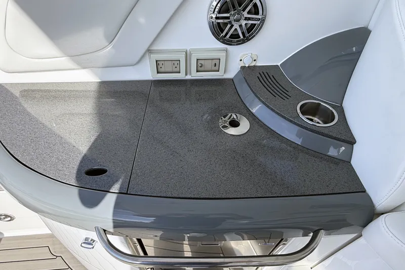 Slide: The Image of Interior of 2016 Formula 40 Performance Cruiser with sleek countertop and built-in speaker. - 14