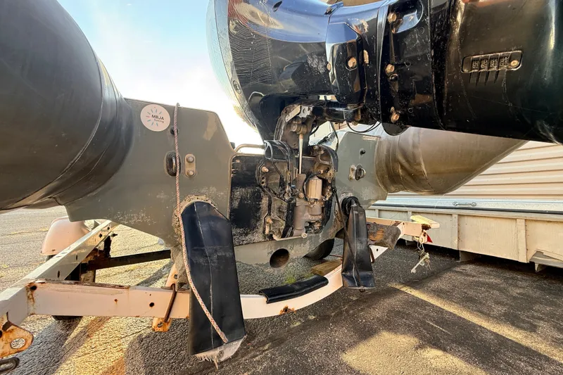 Slide: The Image of 2014 Zodiac Milpro SR 4.70 boat engine and hull on trailer. - 19
