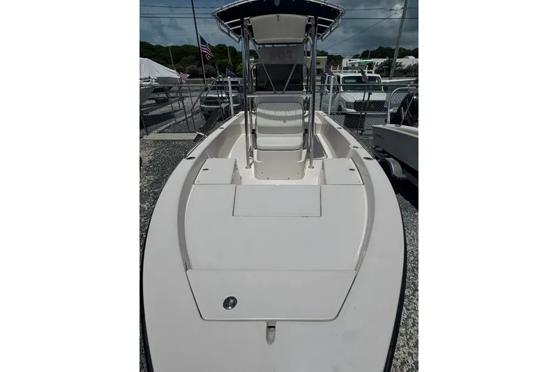 Slide: The Image of 2003 Pathfinder 2200 V boat with center console, parked outdoors. - 3