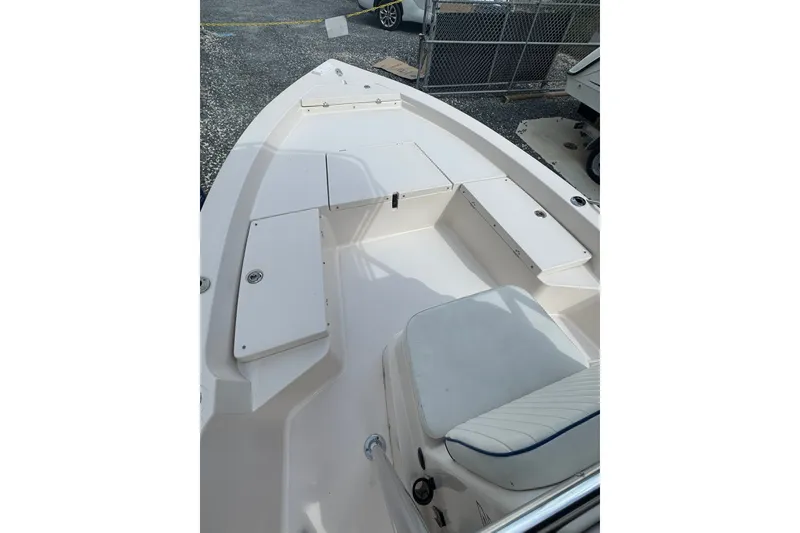 Slide: The Image of 2003 Pathfinder 2200 V boat interior with seating and storage compartments. - 6
