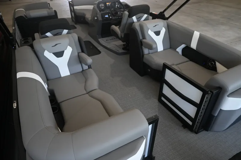 Slide: The Image of The image shows the interior of a 2027 Evotti 521QL boat with gray and white seating. - 11