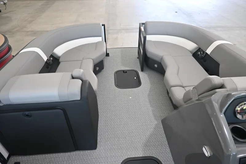 Slide: The Image of The image shows the interior of a 2027 Evotti 521QL boat with gray upholstered seating. - 8