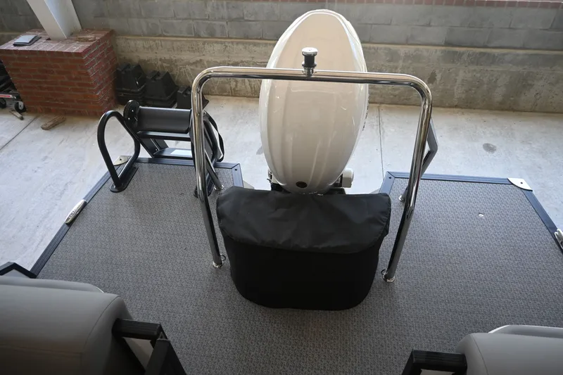 Slide: The Image of The image shows the deck of a 2027 Evotti 521QL boat with a white seat. - 10