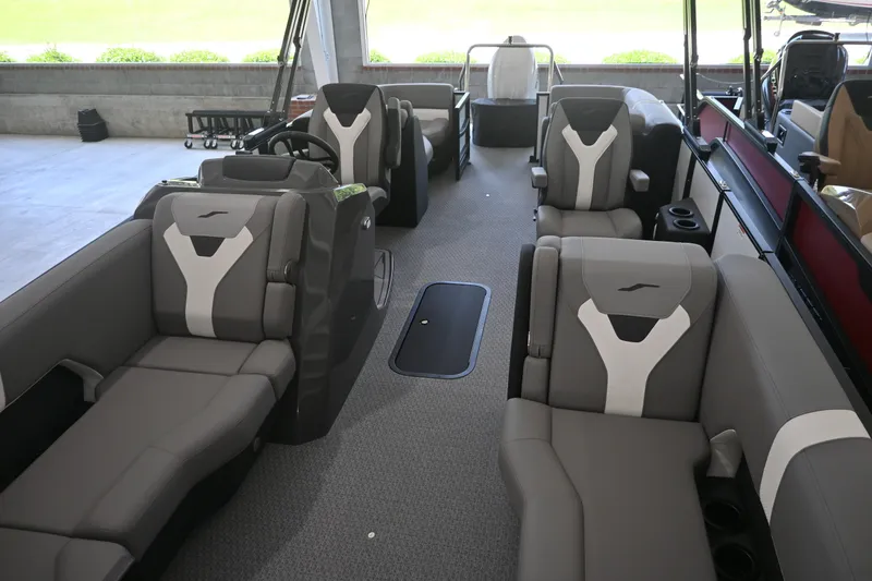 Slide: The Image of The image shows the interior of a 2027 Evotti 521QL boat with gray seating. - 6
