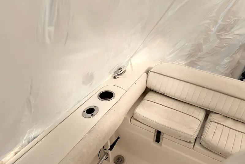 Slide: The Image of Interior of 2014 Sea Fox 226 Commander boat with seating and cup holders. - 14