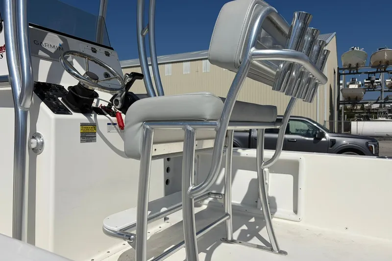 Slide: The Image of 2021 KenCraft BAYRIDER 2260FS boat interior with steering console and seating. - 10