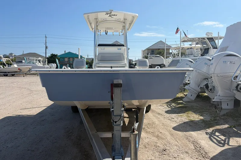 Slide: The Image of 2021 KenCraft BAYRIDER 2260FS boat on trailer, parked outdoors under clear sky. - 4