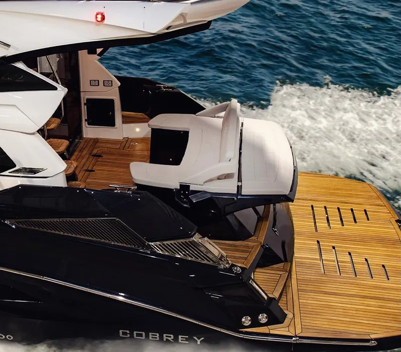 Slide: The Image of Luxury Cobrey 45 FLY yacht cruising on the ocean, showcasing elegant design, 2025 model. - 15