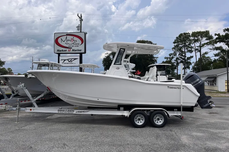 The Image of 2027 Tidewater 232 LXF boat on trailer at Marker 17 Marine dealership. - 0