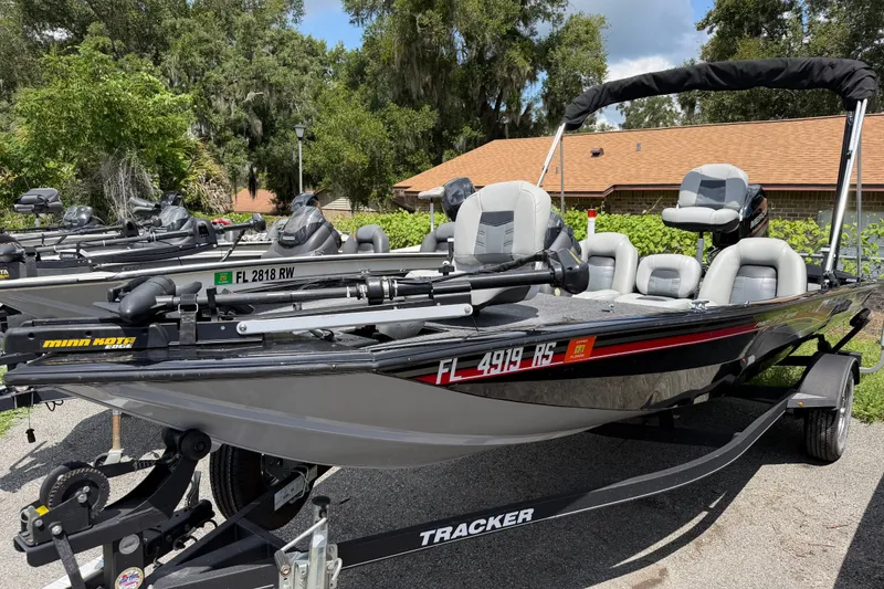 The Image of 2018 Tracker Pro Team 175 TXW fishing boat on trailer, parked outdoors. - 36