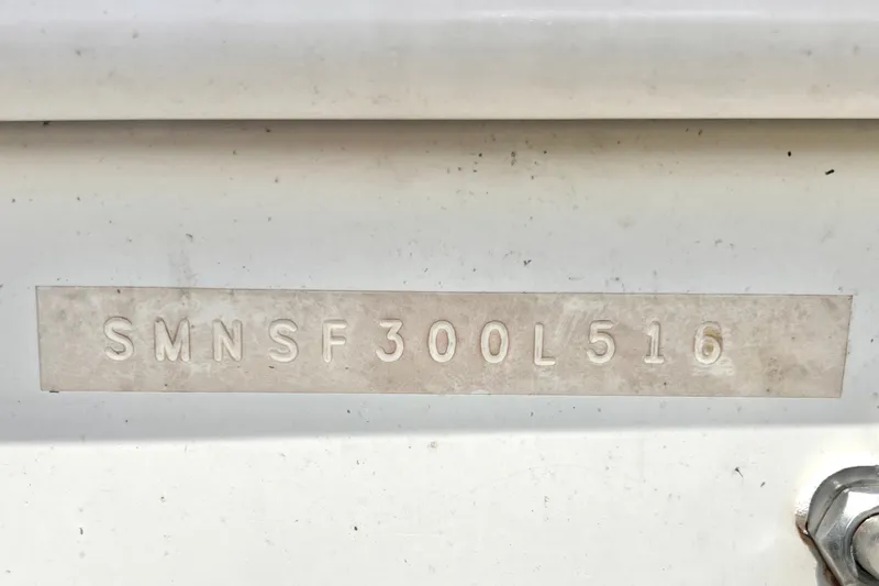 Slide: The Image of Hull identification number on 2016 Sportsman Heritage 231 Center Console boat. - 57