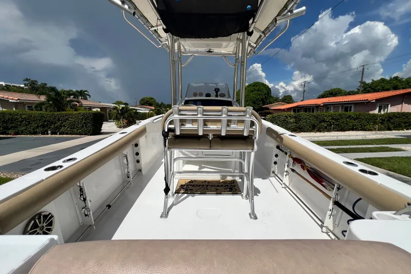 Slide: The Image of 2016 Sportsman Heritage 231 Center Console boat interior with seating and console view. - 13