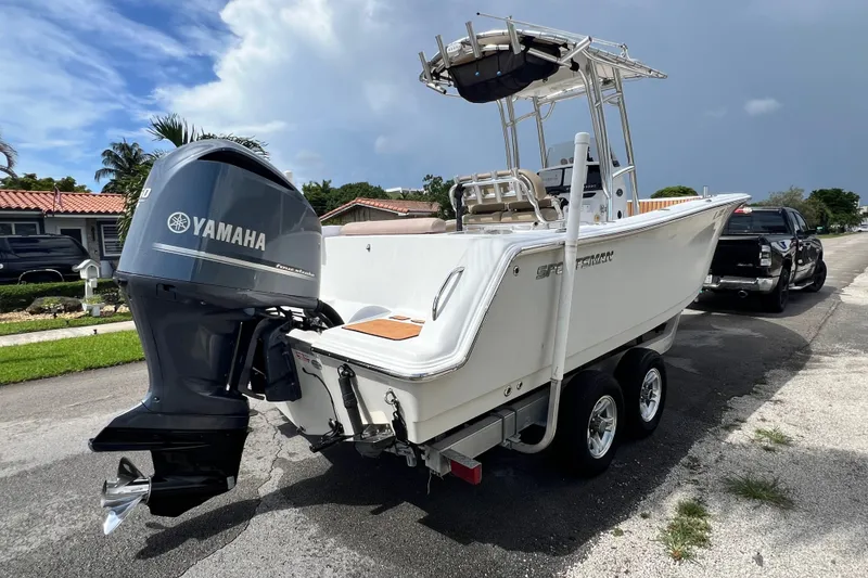 Slide: The Image of 2016 Sportsman Heritage 231 Center Console boat with Yamaha engine on trailer. - 8