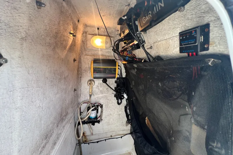 Slide: The Image of 2016 Sportsman Heritage 231 Center Console interior wiring and equipment setup. - 31