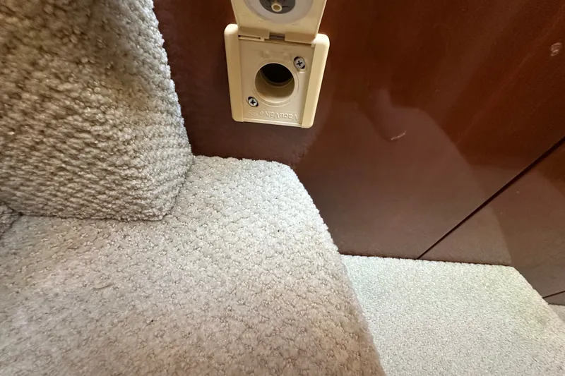 Slide: The Image of Carpeted interior of a 2007 Meridian 411 Sedan with a wall socket. - 83